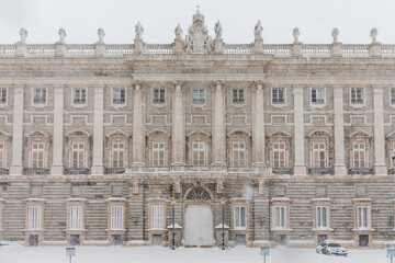 Fototapeta na wymiar Royal Palace in madrid theater covered by snow from the storm philomena