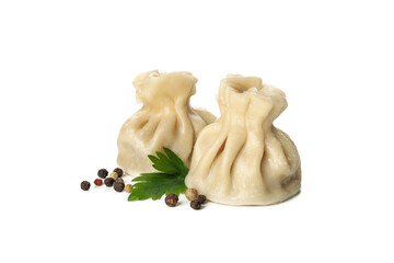 Fototapeta premium Tasty khinkali, parsley and pepper isolated on white background