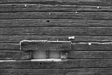 Small Window On A Wooden Wall
