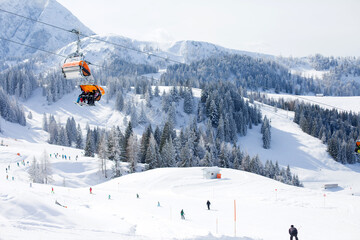 Naklejka na ściany i meble Winter snowy landscape of a ski areal in Austria