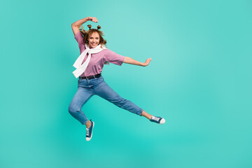 Full size profile side photo of young lovely pretty cheerful positive girl jump does karate isolated on turquoise color background