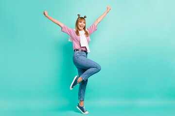Fototapeta na wymiar Full body photo of young excited girl happy smile rejoice win victory tight jumper isolated over turquoise color background