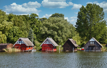 Wooden boathouses in Mueritz National Park, Mecklenburg Lake District,Germany....