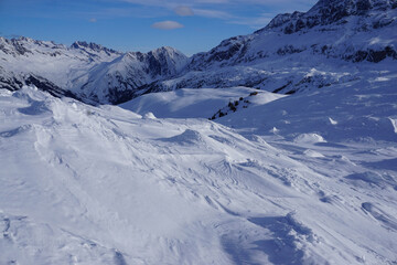 winter mountain landscape with snow dunes in the French Alps