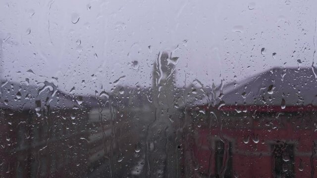rainy days .rain drops on the window surface 