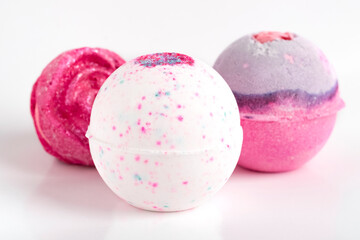 set of beautiful bath bombs. Aromatic bath salts in the form of a ball. Light background