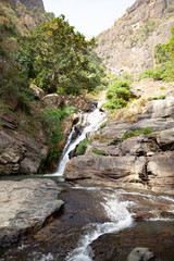 Ravana Waterfall in a rutting mountain gorge in Sri Lanka.
