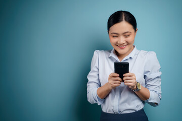 Asian woman happy use smart phone isolated on background.