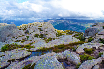 Beautiful mountain landscape. Scenery along the Preikestolen pathway. Preikestolen or Pulpit Rock is a famous tourist attraction in Norway
