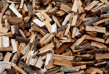 Firewood for the fireplace cut with the ax, to heat the house during the winter. Wood is a beautiful material, fragrant, insulating, with beautiful colors
