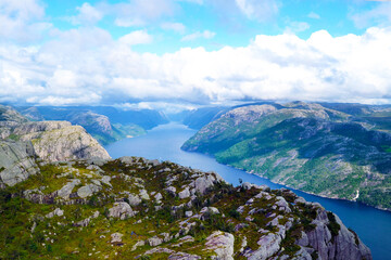 Fototapeta na wymiar Lysefjord aerial panoramic view from the top of the Preikestolen cliff near Stavanger. Preikestolen or Pulpit Rock is a famous tourist attraction in Norway.