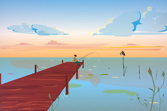 A fisherman sits on the shore of the lake and catches fish. A wooden pier against a beautiful yellow sunset by the sea.