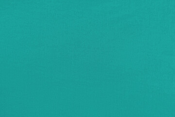 Green homogeneous background with a textured surface