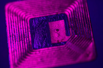 Close up of RFID tag under ultraviolet light.