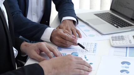 Startup business people teamwork calculating a valuation in workplace..