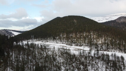 hills covered in snow in winter