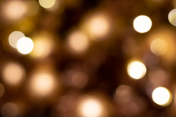 Fototapeta premium Golden abstract bokeh background with lights