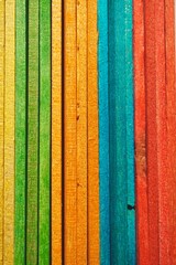 multi colored wooden sticks, colorful bakcground