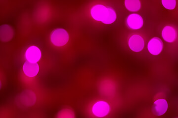 Pink and red abstract bokeh background with lights