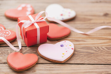 Heart shaped cookies for Valentine's day or Mother's day on wooden background.