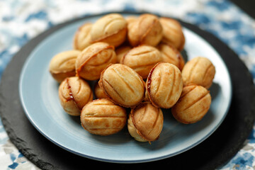 Sweet national Russian cookies - nuts with condensed milk.
