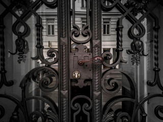 Wrought iron front door with glass and Art Nouveau decorations. Schmiedeeiserne Haustüre mit Glas...