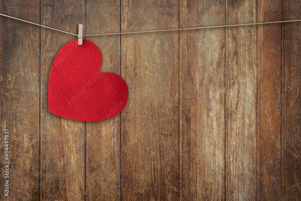 Wall mural Red heart hanging on Wood Background and Texture vertical, Vintage toned.