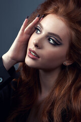 Fashion portrait of beautiful red hair woman