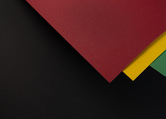 February Black History Month. Abstract Paper geometric black, red, yellow, green background. Copy space, place for your text.
