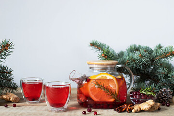 Fruit and berry tea with cranberries orange rosemary and cinnamon.