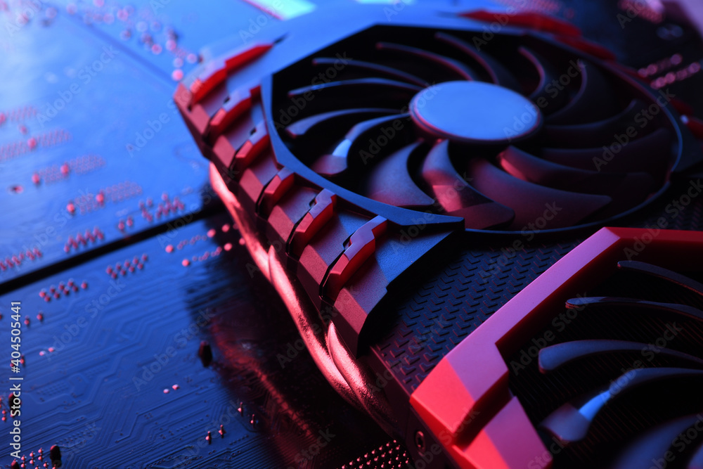 Poster computer game graphics card, videocard with two coolers on circuit board ,motherboard background. cl