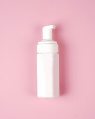 Soap bottles with pump mockup isolated on pink background. Cosmetic plastic bottle with different caps (spray, dispenser pump). Liquid container for gel, lotion, cream, shampoo, bath foam.