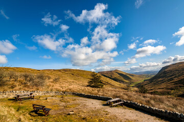 Blue sky, mountains and valley with picnic tables in Ardara, County Donegal, Ireland