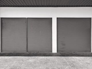 Steel shutter door of warehouse, storage or storefront for metal door background and textured.