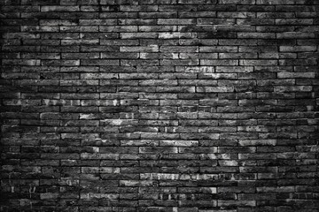 Old vintage retro style dark bricks wall background and texture.