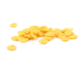 Falling corn flakes. Traditional dry breakfast cereal isolated