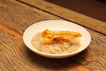 Pork risotto with fried banana-da-terra fruit chips.
