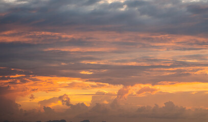 Sunset dramatic with beautiful layer of orange clouds sky background