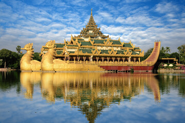 Burmese royal barge Golden Karaweik palace on Kandawgyi Lake in Bogyoke Park in Yangon, Myanmar...