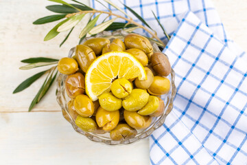 Cracked green olives. Cracked green olives with lemon. Turkish style olive (Turkish name; kirma zeytin)