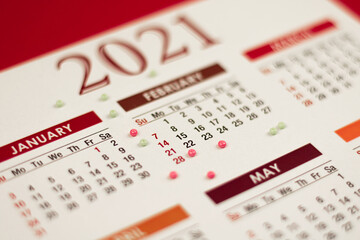 Love theme Valentine's Day 2021 calendar on a red background close up macro photo at 14 february