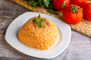 Traditional delicious Turkish food; rice pilaf with tomatoes (Turkish name; Domatesli pirinc pilavi)