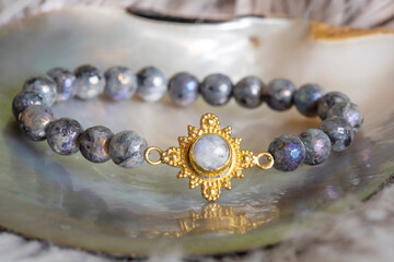 Mineral stone beads bracelet on neutral natural background