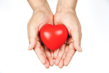 heart on hand for philanthropy concept  The old woman's hand holding a red heart in hands for valentines day or donate help give love warmth take care , World Health Day