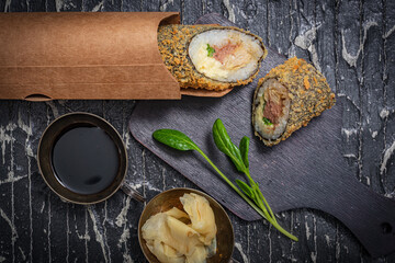 Still life. Japanese cuisine- roll in a package