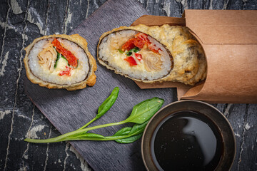 Still life. Japanese cuisine- roll in a package