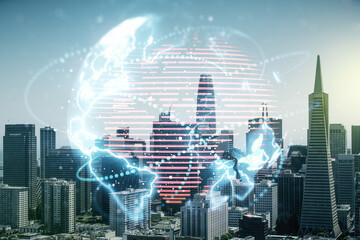 Fototapeta na wymiar Double exposure of abstract digital world map hologram with connections on San Francisco office buildings background, big data and blockchain concept