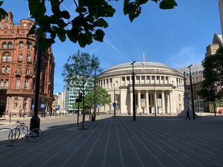 Central library in Manchester City centre. Incredible old dome building with a blue sky background. 