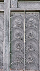 Image of a Beautiful decorative cast iron wrought fence with artistic forging. Metal guardrail...