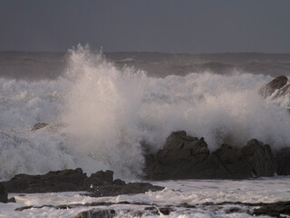 Dark winter breaking waves